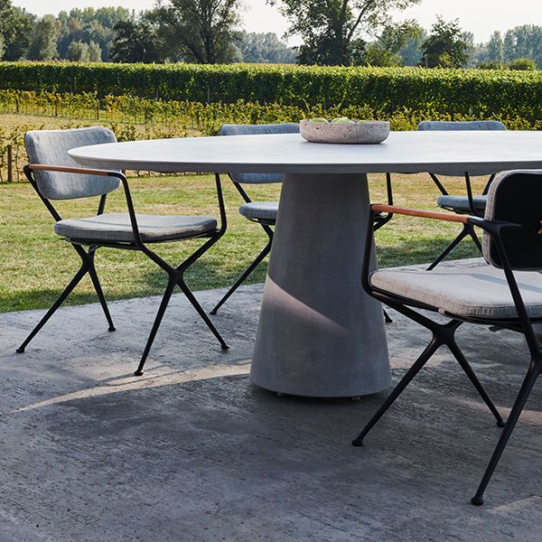 Conix Oval Concrete Table and Exes Chairs